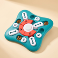 Huddlepaw Puzzle Board in teal with red centre ring and white sliding covers, matching the supplied product